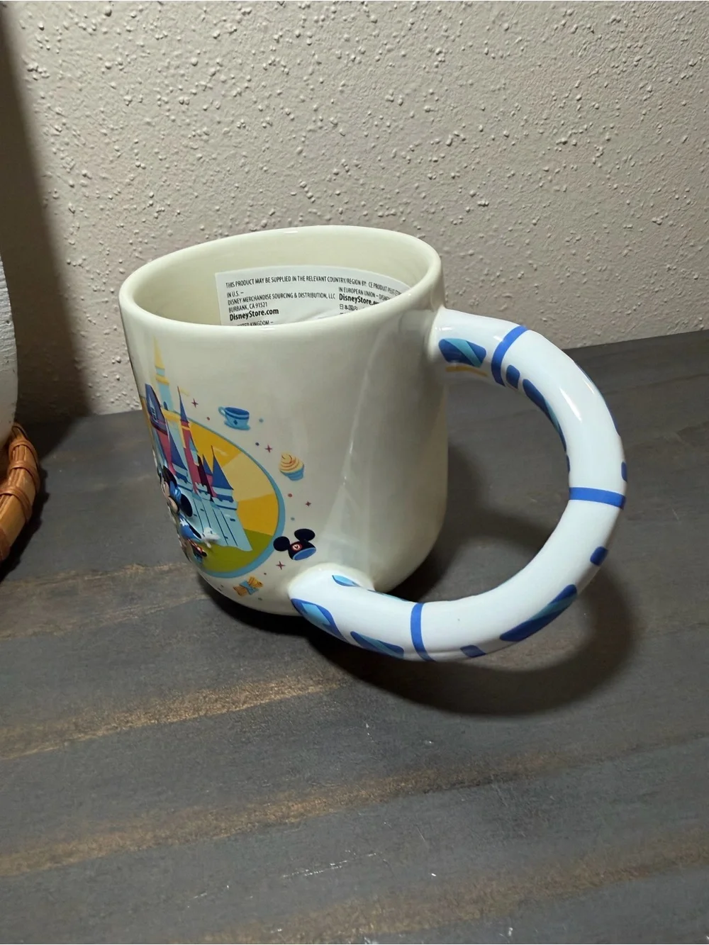 Disney mug w Mickey and Minnie featuring a monorail handle NWT